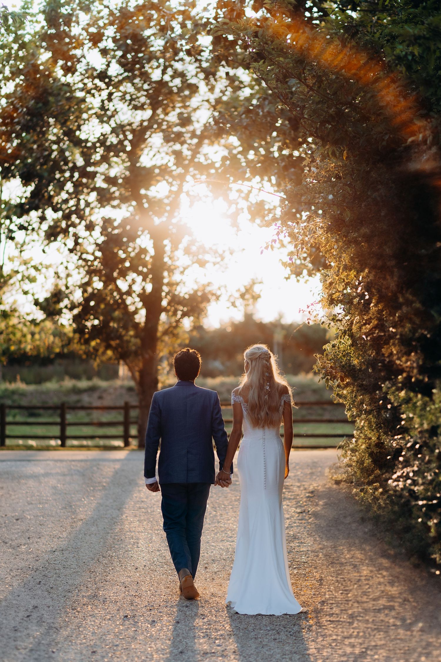 Cotswolds wedding couple portraits in the countryside.