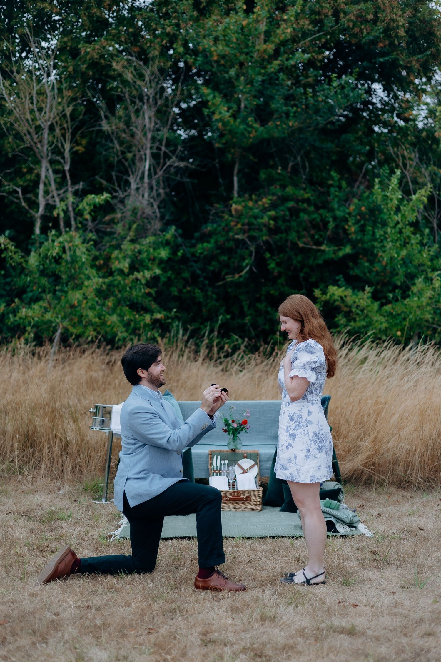 Cotswolds couple celebrating their engagement outdoors.