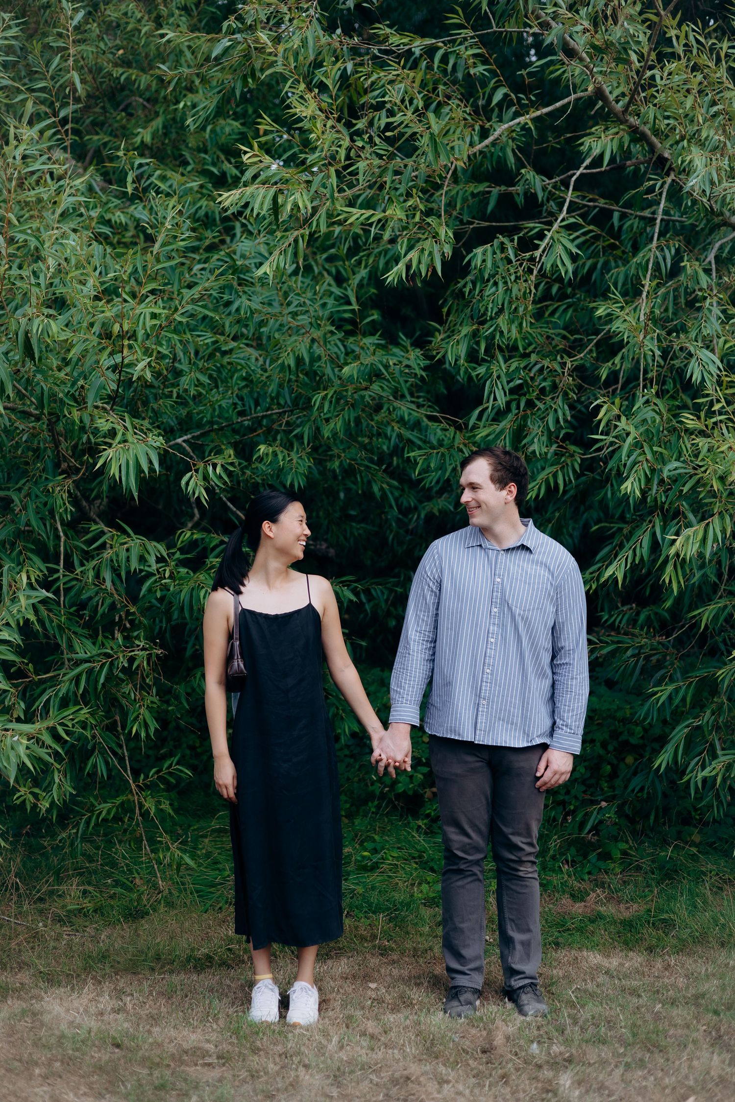 Couple celebrating a surprise engagement in the Cotswolds.