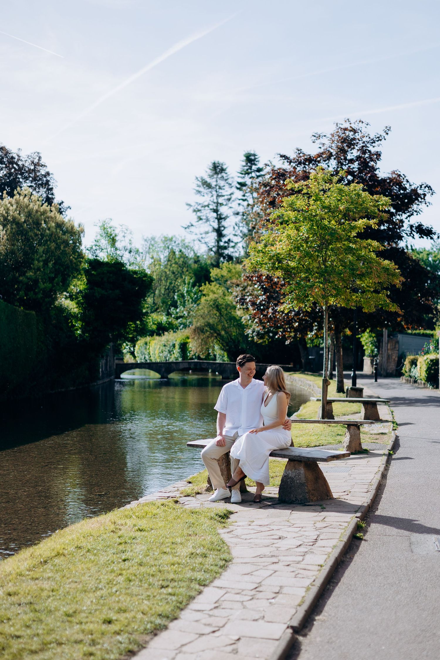 Romantic engagement photos in Bourton-on-the-Water after a proposal.