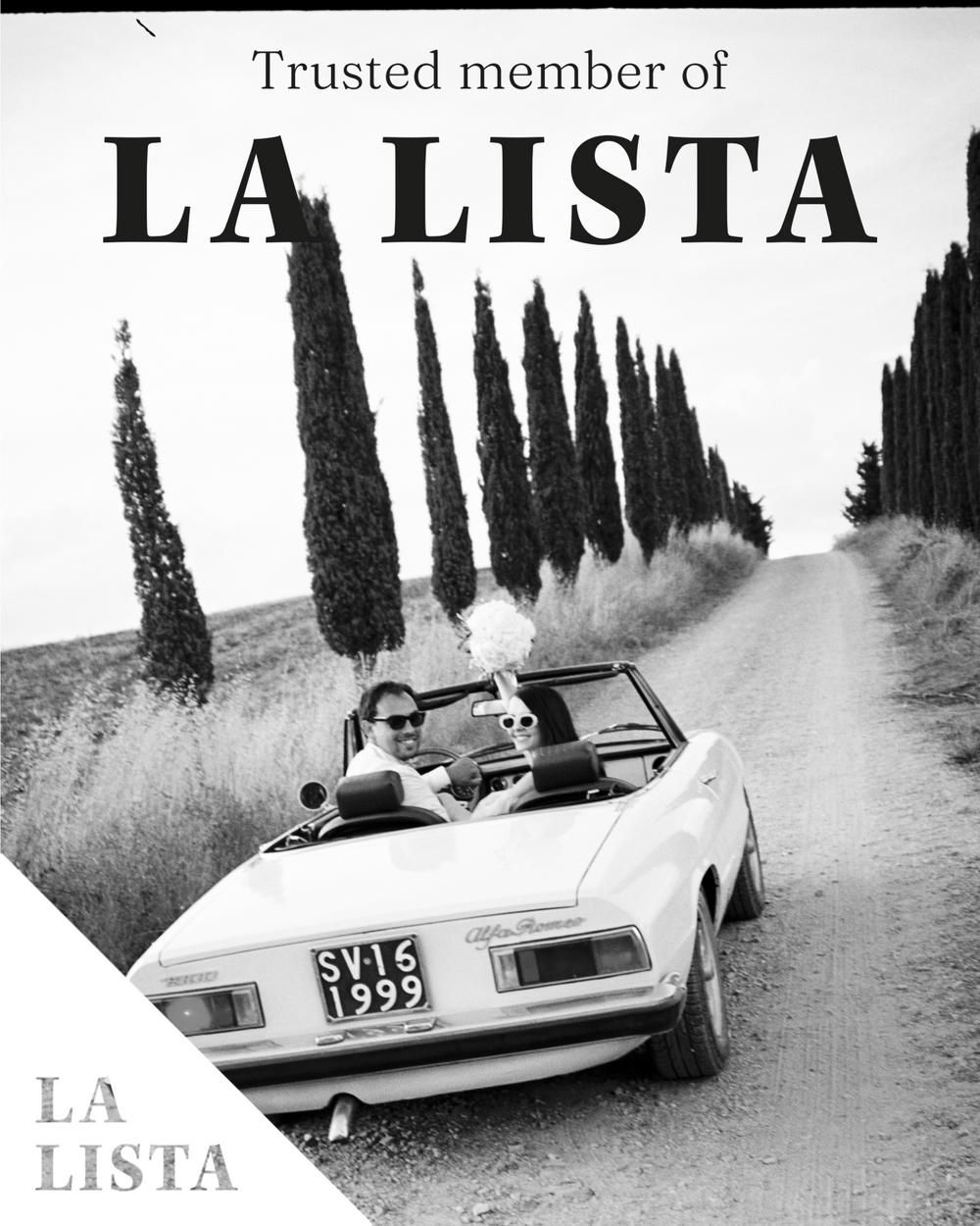 Trusted member of La Lista badge featuring couple driving vintage white convertible down Tuscan cypress-lined road.