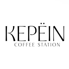 Kepein Coffee Station logo featuring bold serif typography with decorative umlaut dots on a white background.