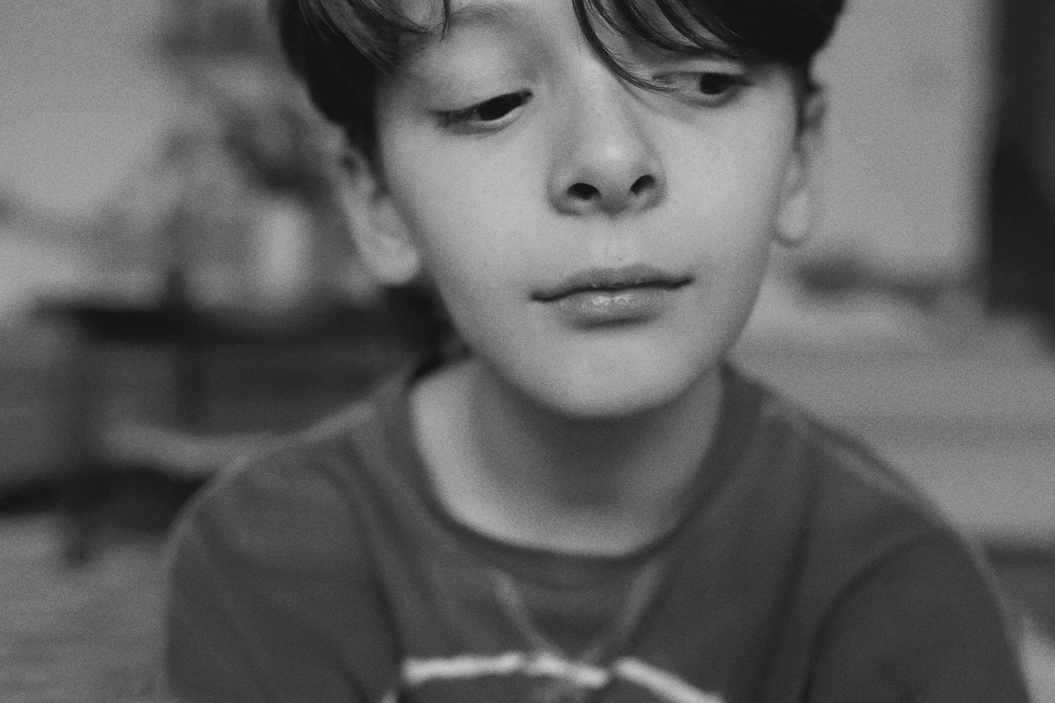 A series of black and white portraits showing different angles and expressions.