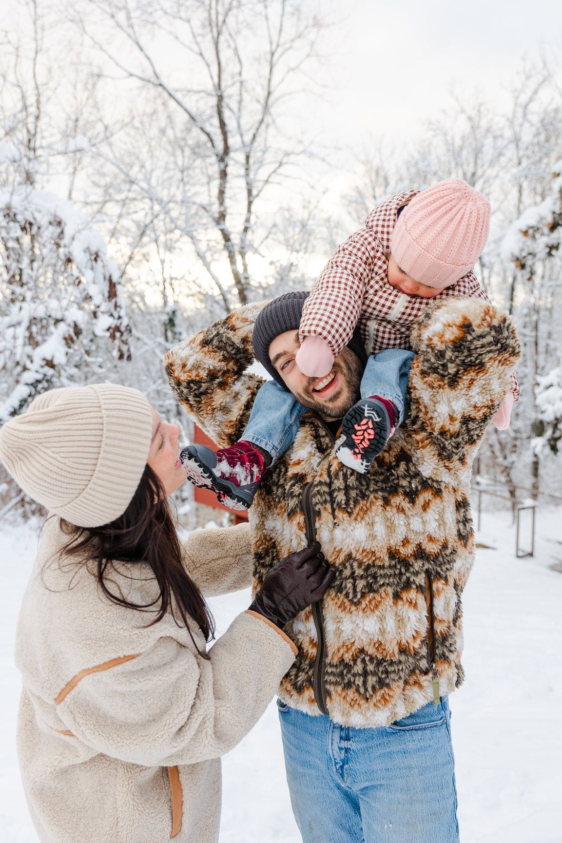Candid winter moments showing people playing and laughing in the snow.