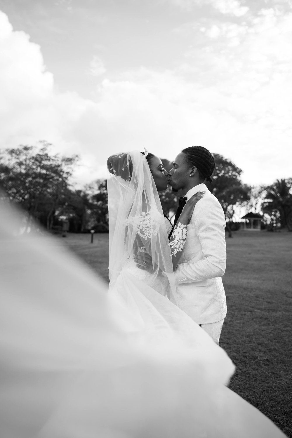 Happy wedding couple in St Lucia during couples photoshoot, capturing real emotion, connection, and authentic moments together