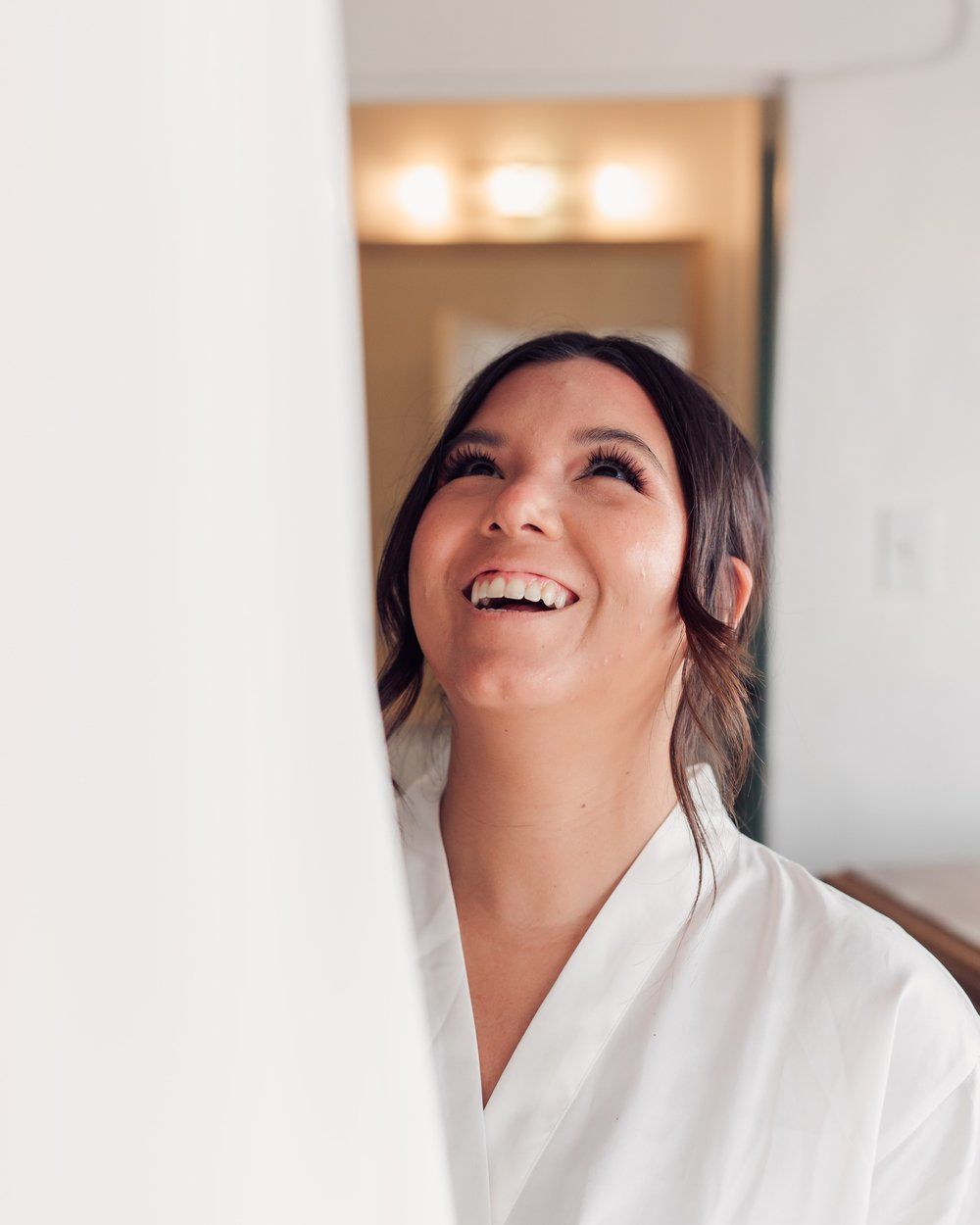 Bride getting ready on wedding day in St Lucia, capturing natural emotion, preparation moments, and intimate bridal details