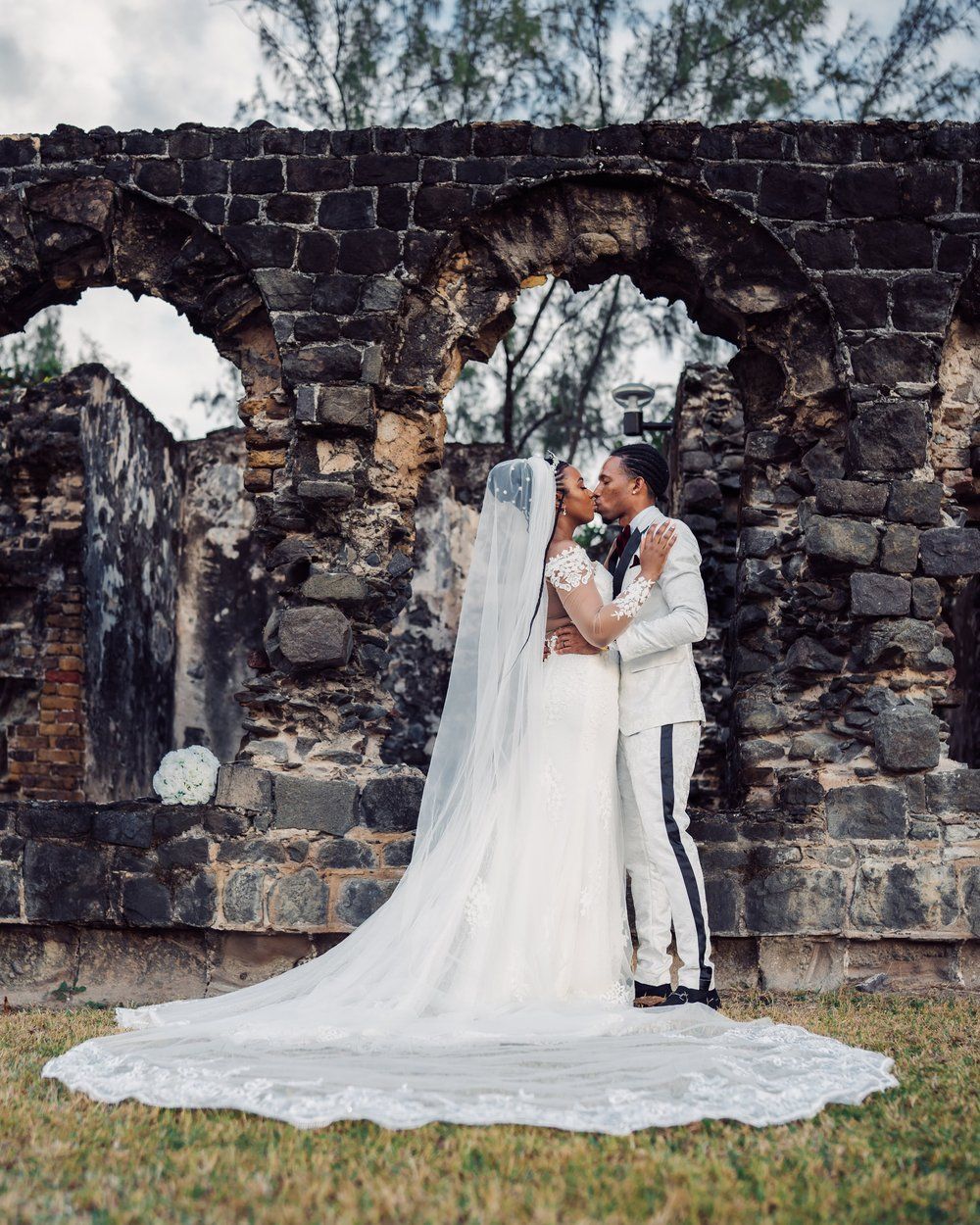 Happy wedding couple in St Lucia during couples photoshoot, capturing real emotion, connection, and authentic moments together
