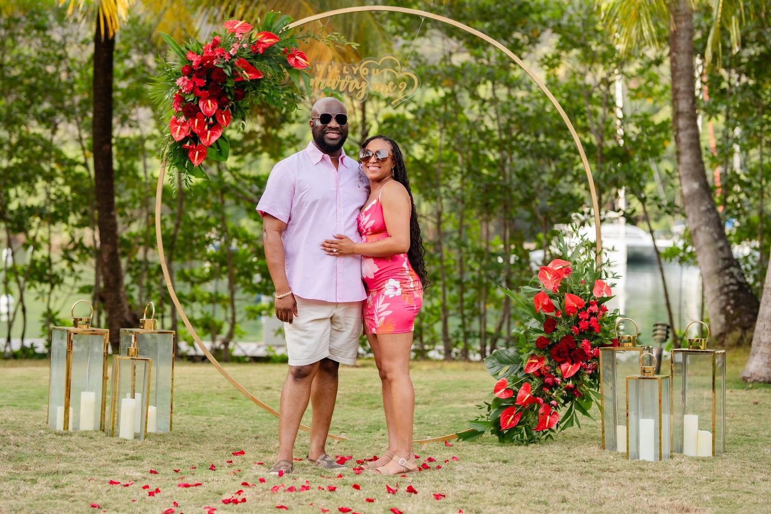 St Lucia beach proposal captured by wedding photographer-videographer, showing emotional surprise engagement moment between couple at sunset