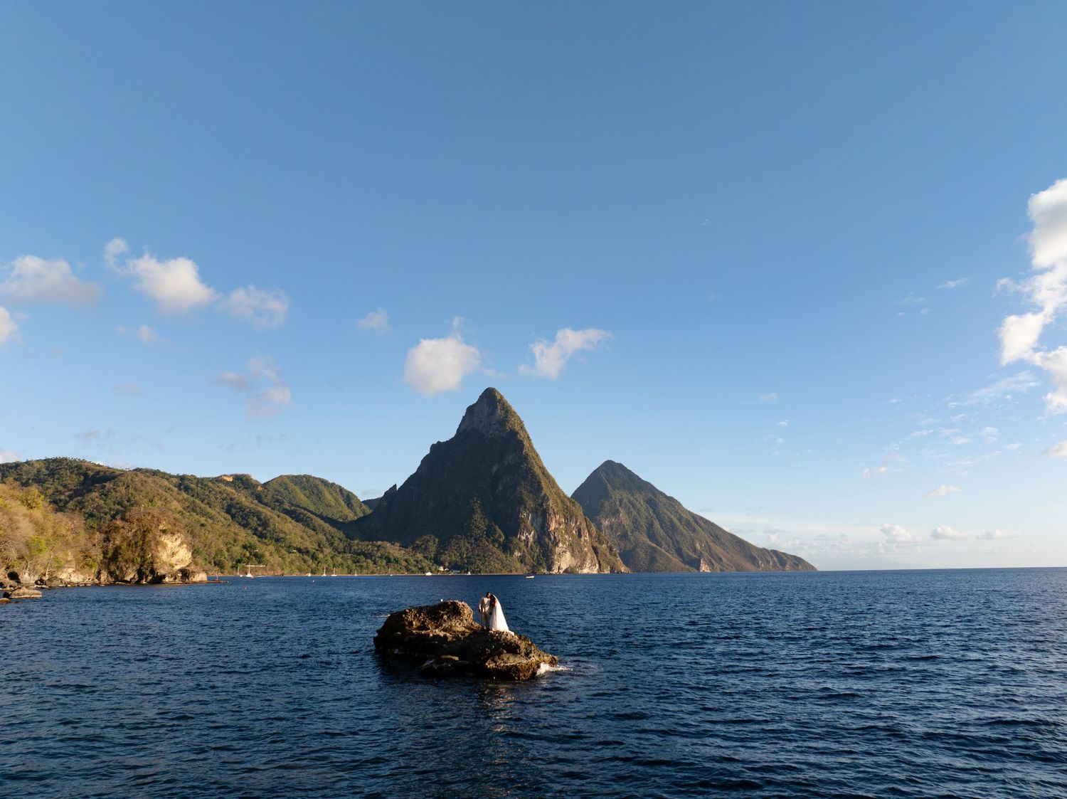 Happy wedding couple in St Lucia during couples photoshoot, capturing real emotion, connection, and authentic moments together at Pitons