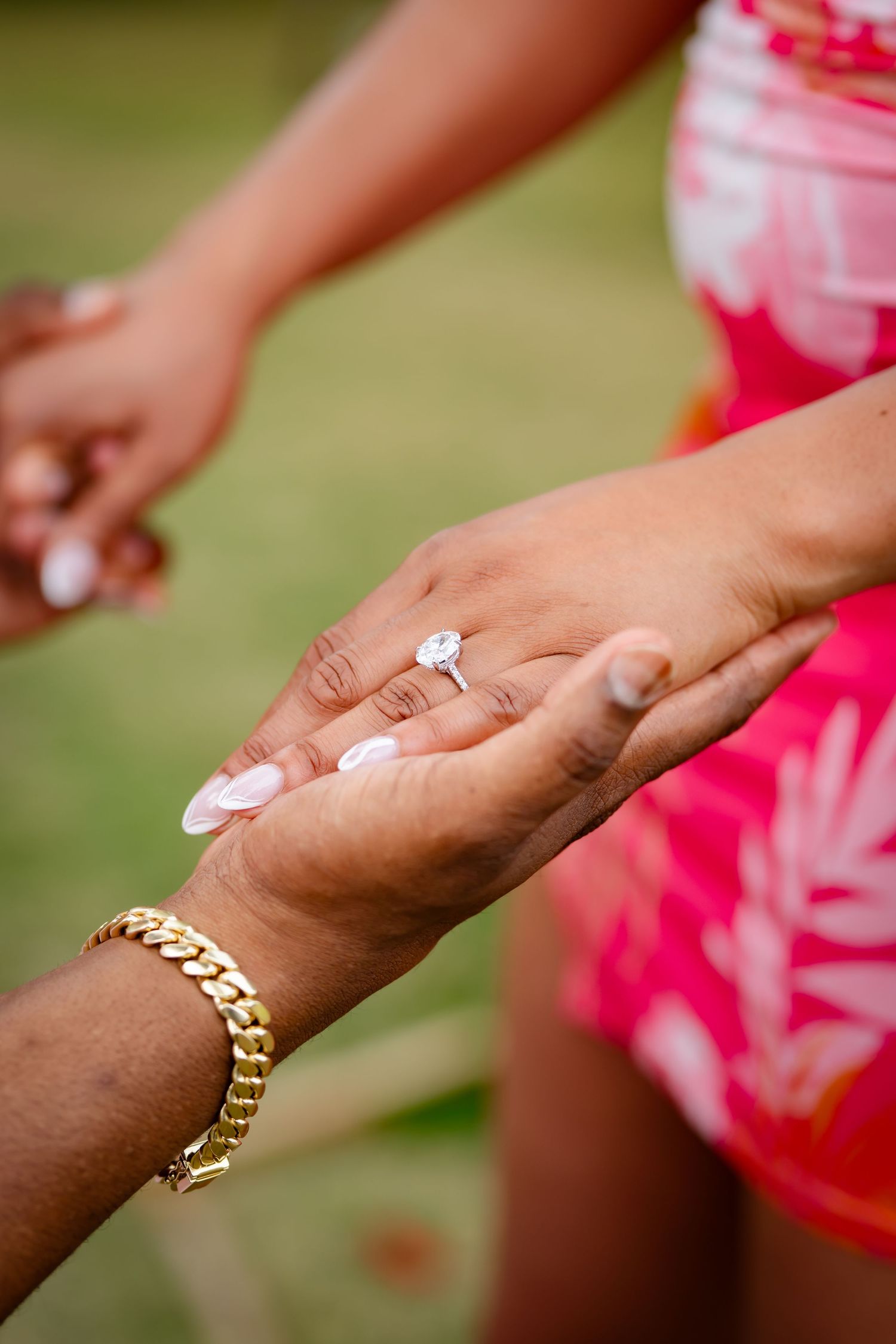 St Lucia beach proposal captured by wedding photographer-videographer, showing emotional surprise engagement moment between couple at sunset