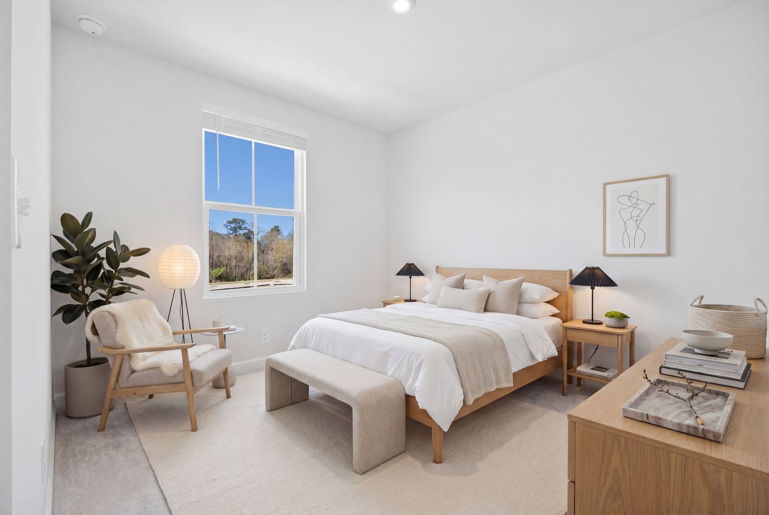 Elegant bedroom with neutral tones, wooden bed frame, potted plant, and natural window light.
