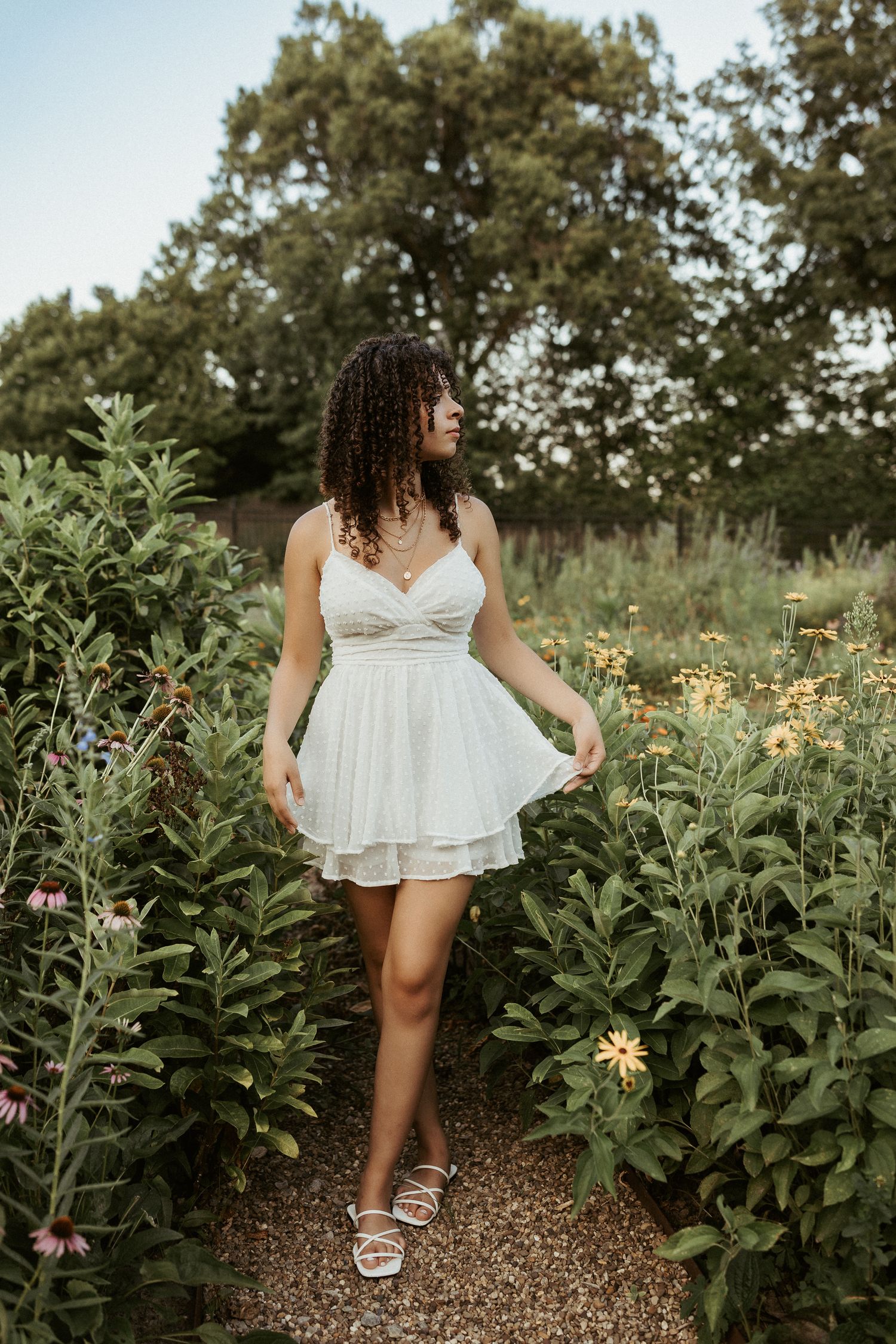 senior portrait of a girl in a white dress in a flower field, by ash coniglio photography, hartwood acres pennsylvania