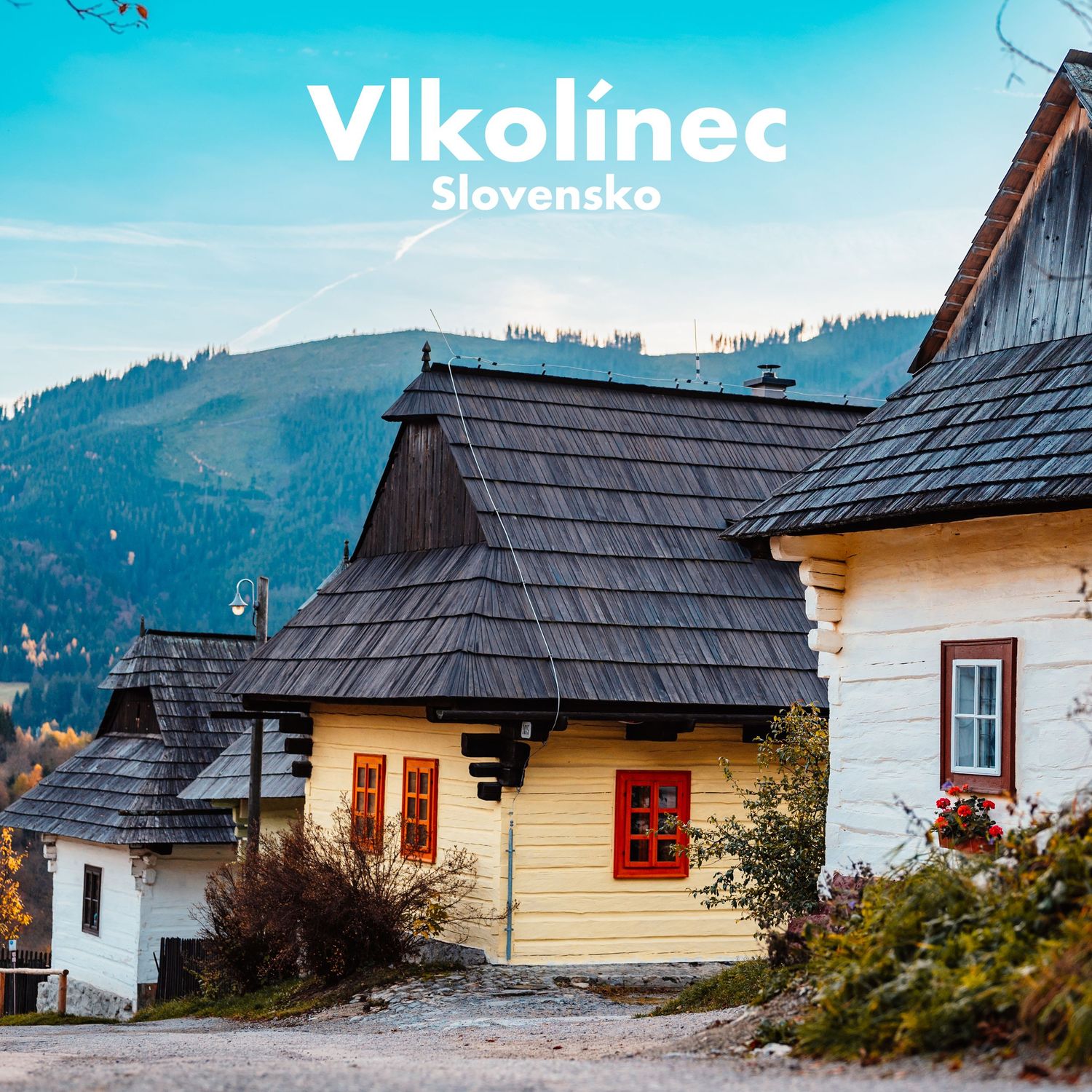 Traditional wooden folk architecture houses with dark roofs in the UNESCO village of Vlkolinec, Slovakia.
