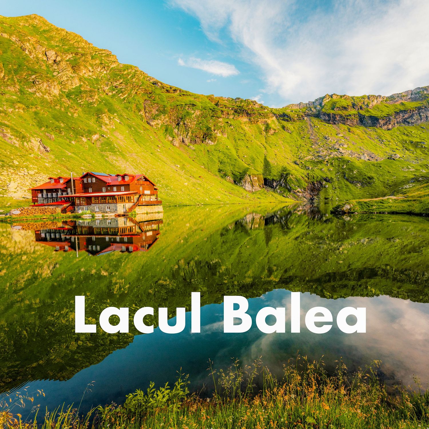 A mountain lodge reflecting in the calm waters of Lacul Balea, a glacial lake in Romania.