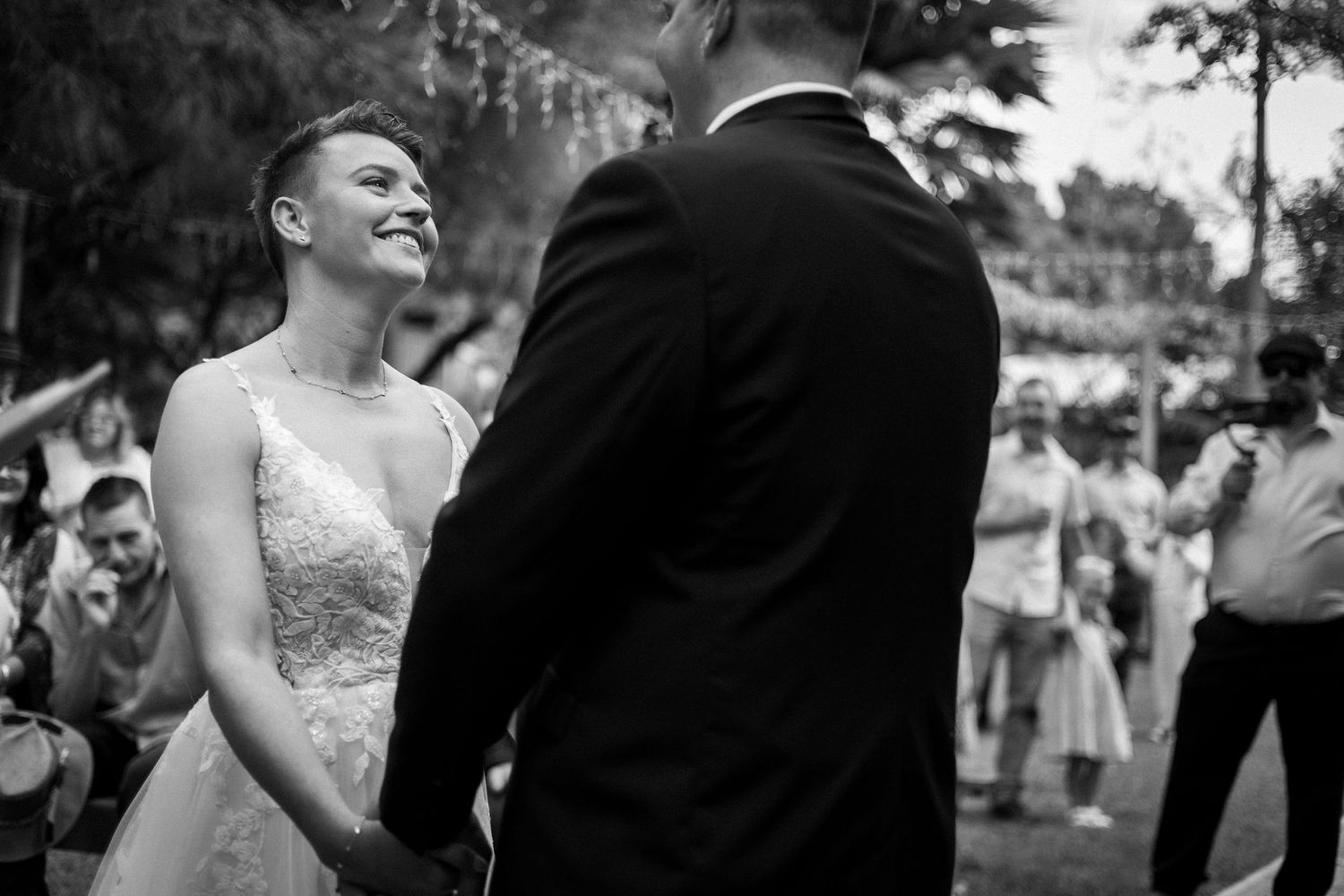 Black and white candid shots of wedding celebration moments.