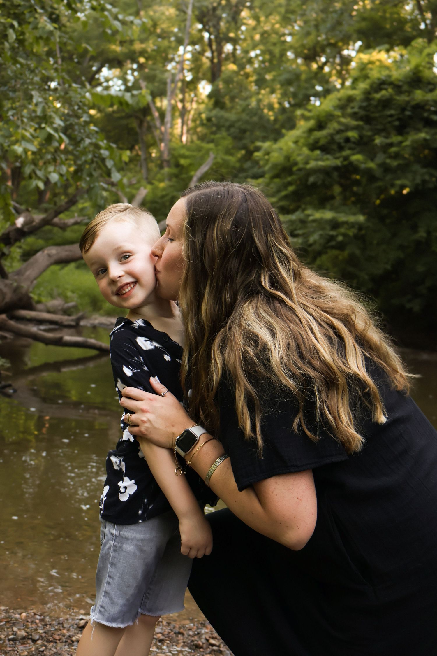 Playful moment captured in a series of candid shots outdoors.