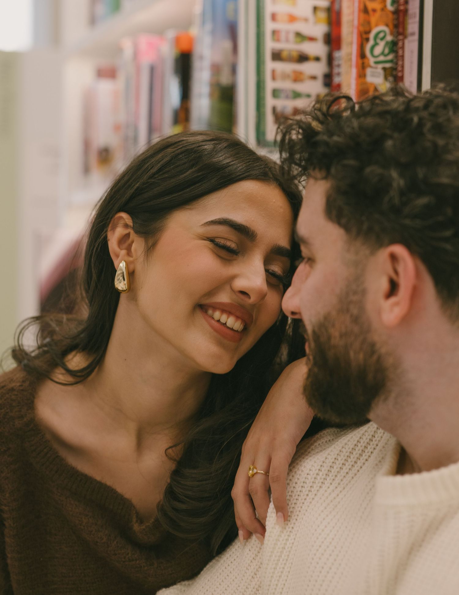 A couple sharing tender intimate moments in a sequence of four romantic photos.
