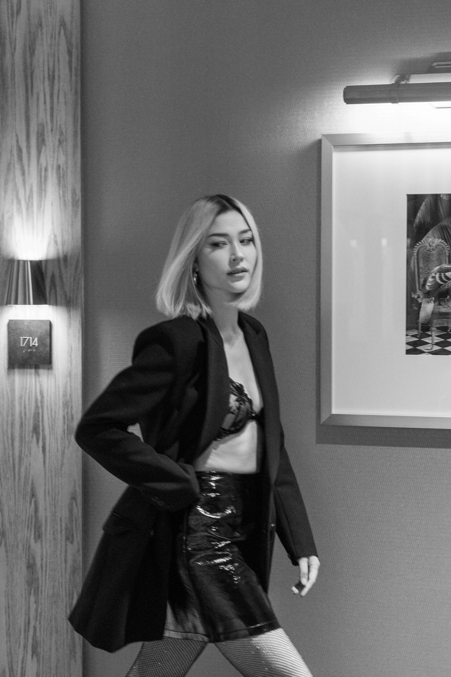 Black and white fashion portrait featuring blazer and leather skirt combination. Calgary Alberta Branding Photographer.