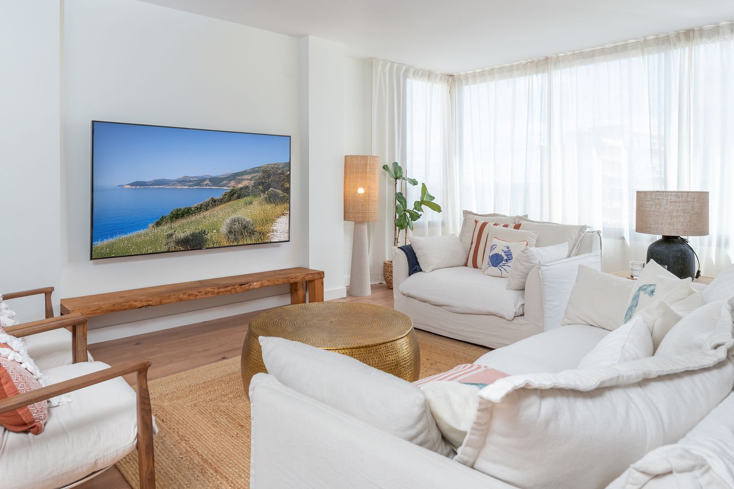 Spacious living room with coastal view in Alicante.Interior and real estate photography highlighting light and layout for property marketing