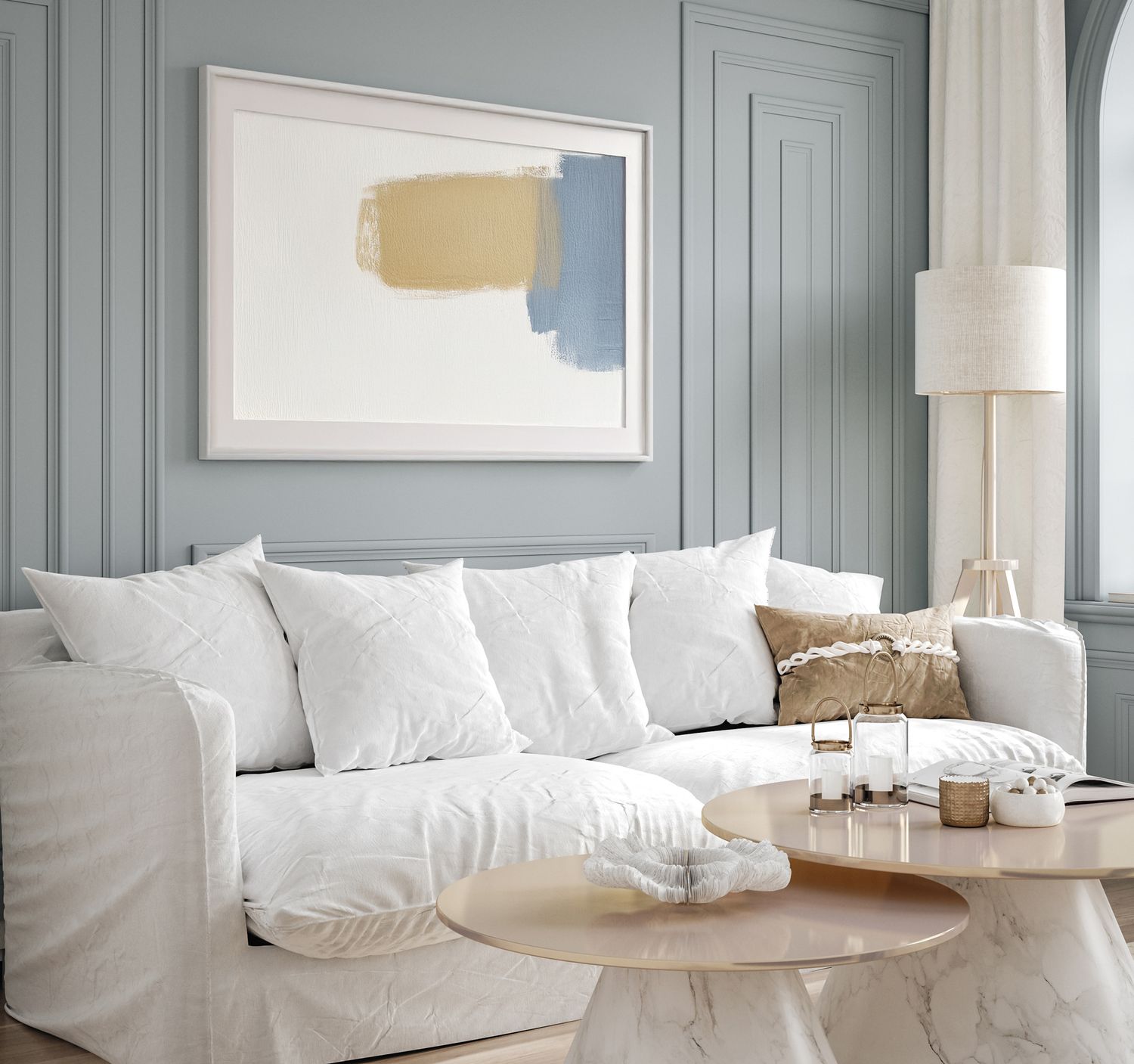 Design-led living room in Alicante with muted blue wall paneling and natural light. Captured for real estate and interior photography.
