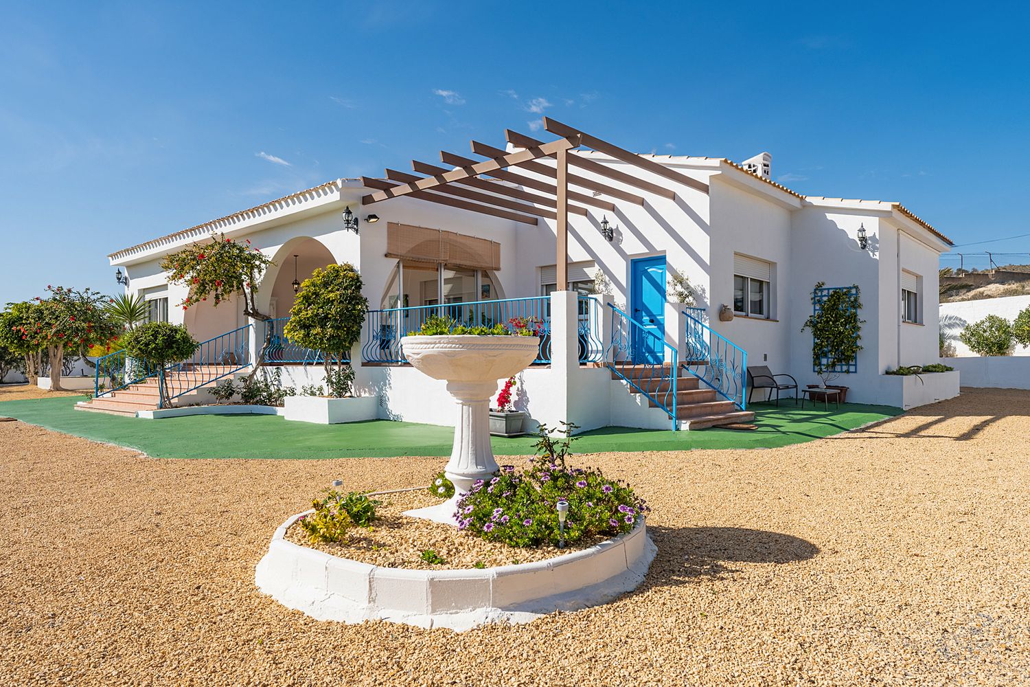 Charming coastal villa exterior in Benidorm, Costa Blanca. Captured for real estate marketing and rental promotion.