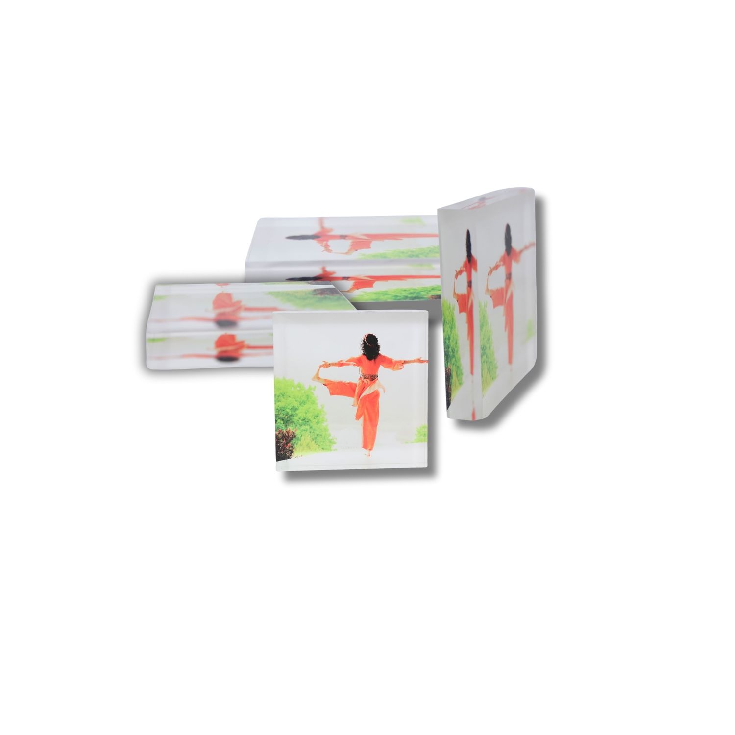 Minimalist abstract artwork featuring red and green geometric shapes on a white background.