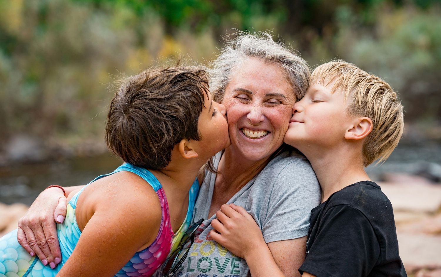A heartwarming collage of people embracing and showing affection outdoors in natural settings.