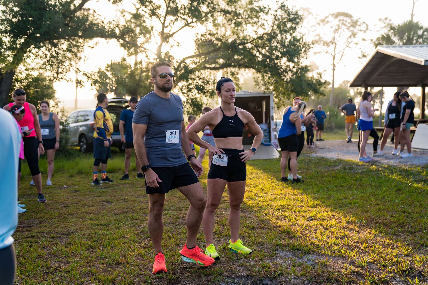 Runners standing outdoors after finishing a race. The photo captures a sense of accomplishment and relief.