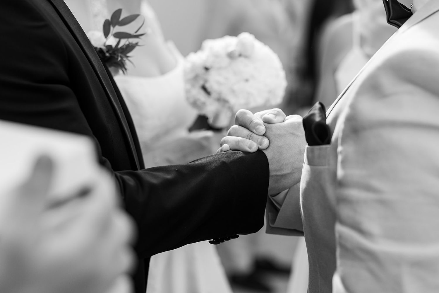 A couple shares a romantic moment during their first dance at an elegant wedding reception.
