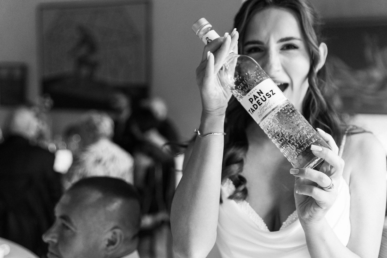 Black and white photos show customers drinking at bar counters and tables in a vintage bar setting.