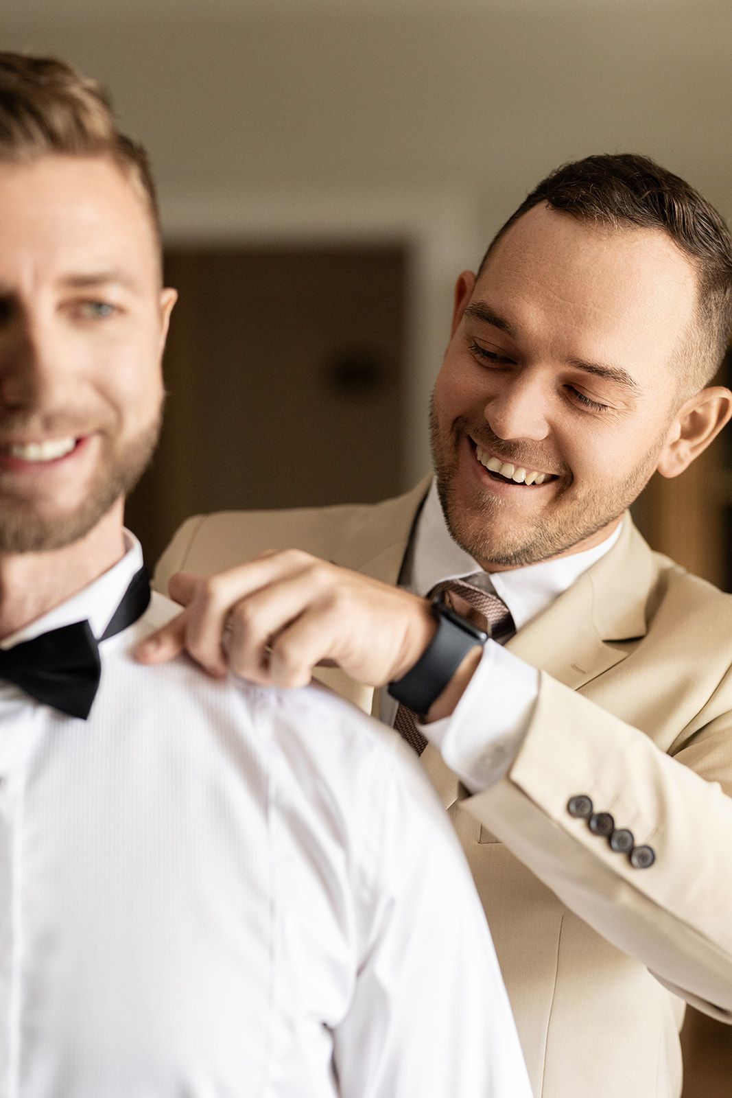 A series of candid moments showing people in beige suits and white shirts smiling and laughing together.