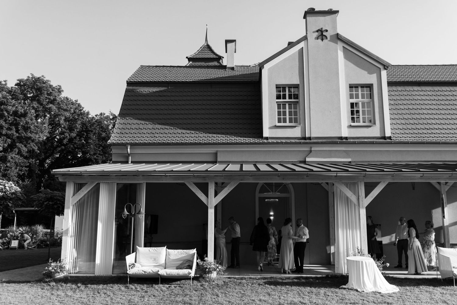 A sequence of black and white architectural photographs showing different views of mid-century modern ranch houses.