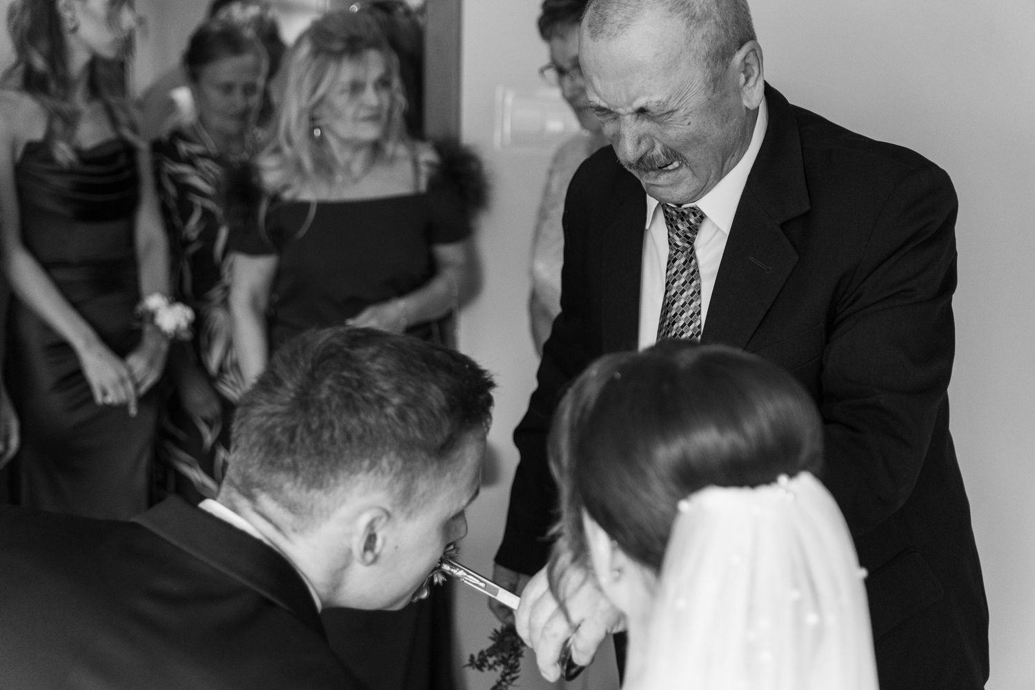 A black and white photo collage shows a couple dancing together at what appears to be a wedding reception.