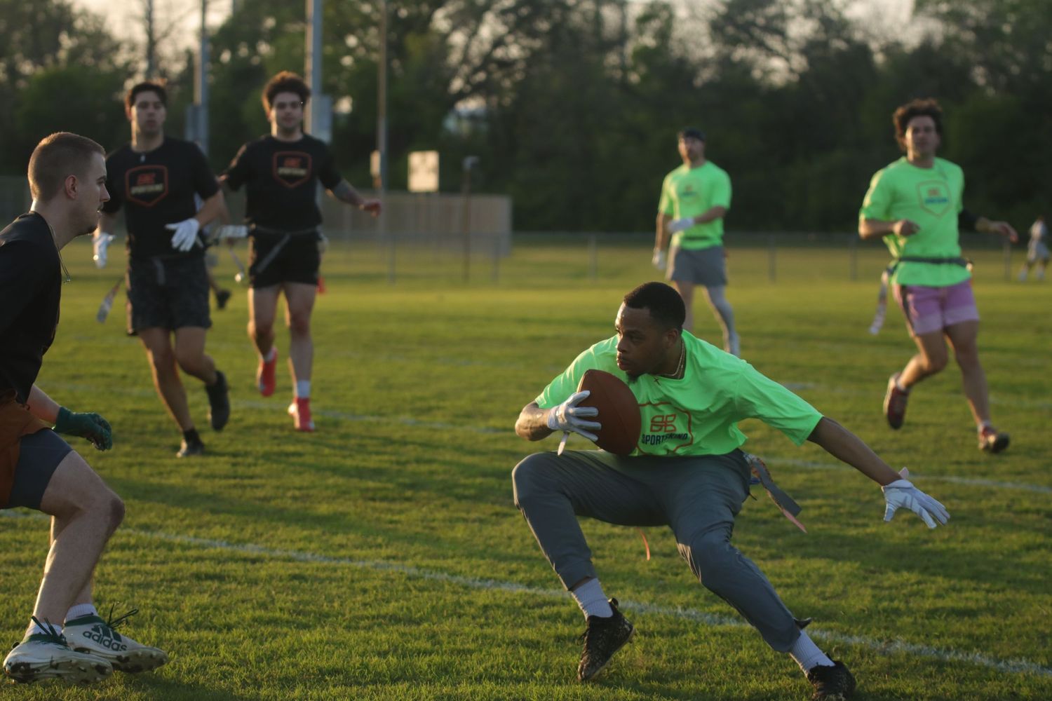 Adult League football game action photographed in Dallas, Texas by Precision Photos TX photographer