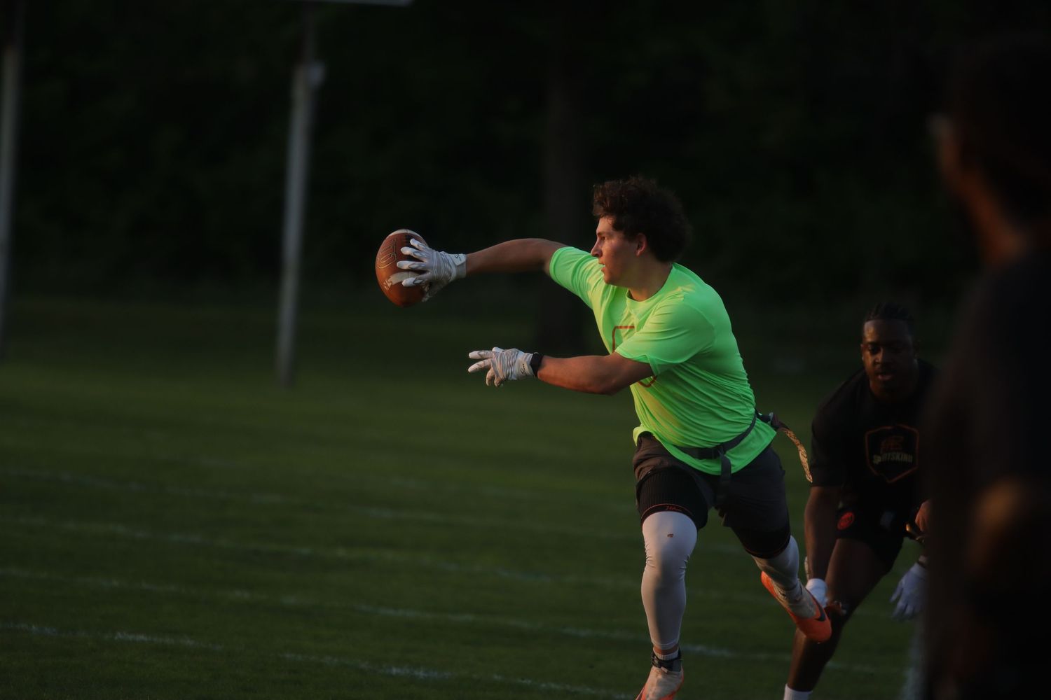 Adult League football game action photographed in Dallas, Texas by Precision Photos TX photographer