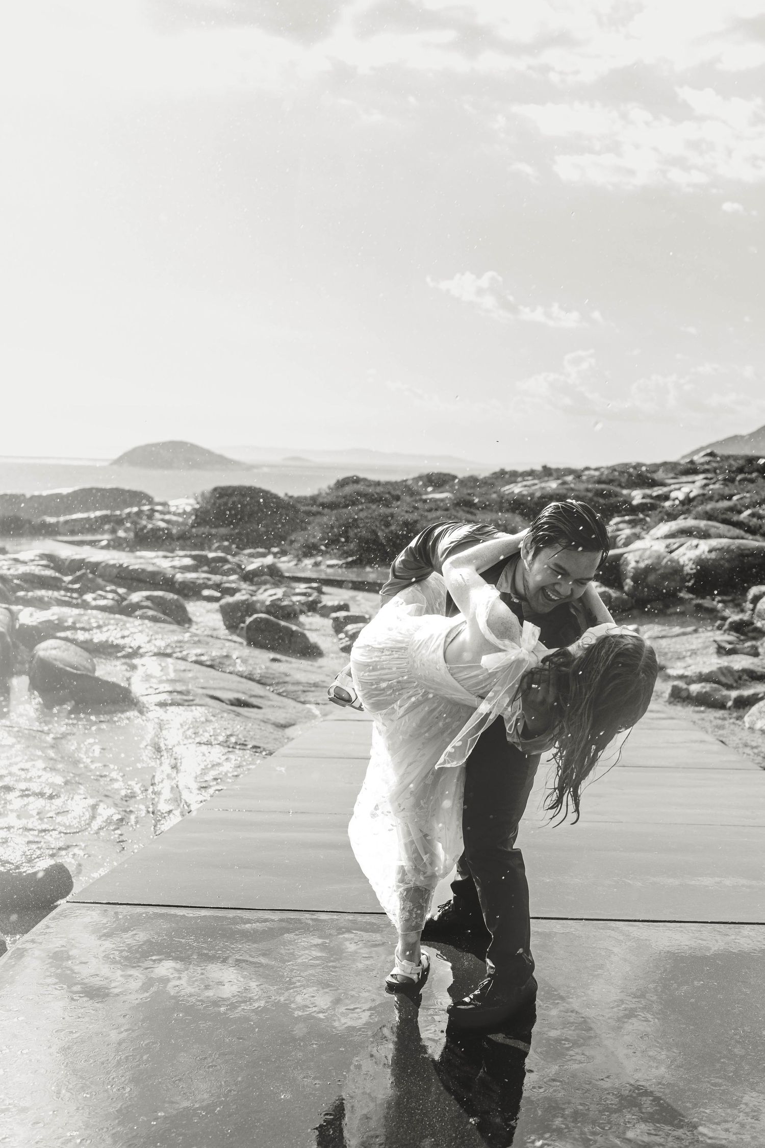 romantic rain wedding love dancing in rain black and white
