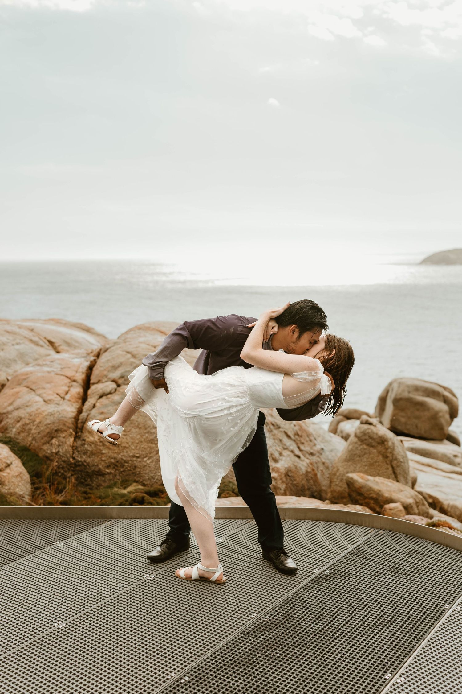 romantic rain kiss wedding