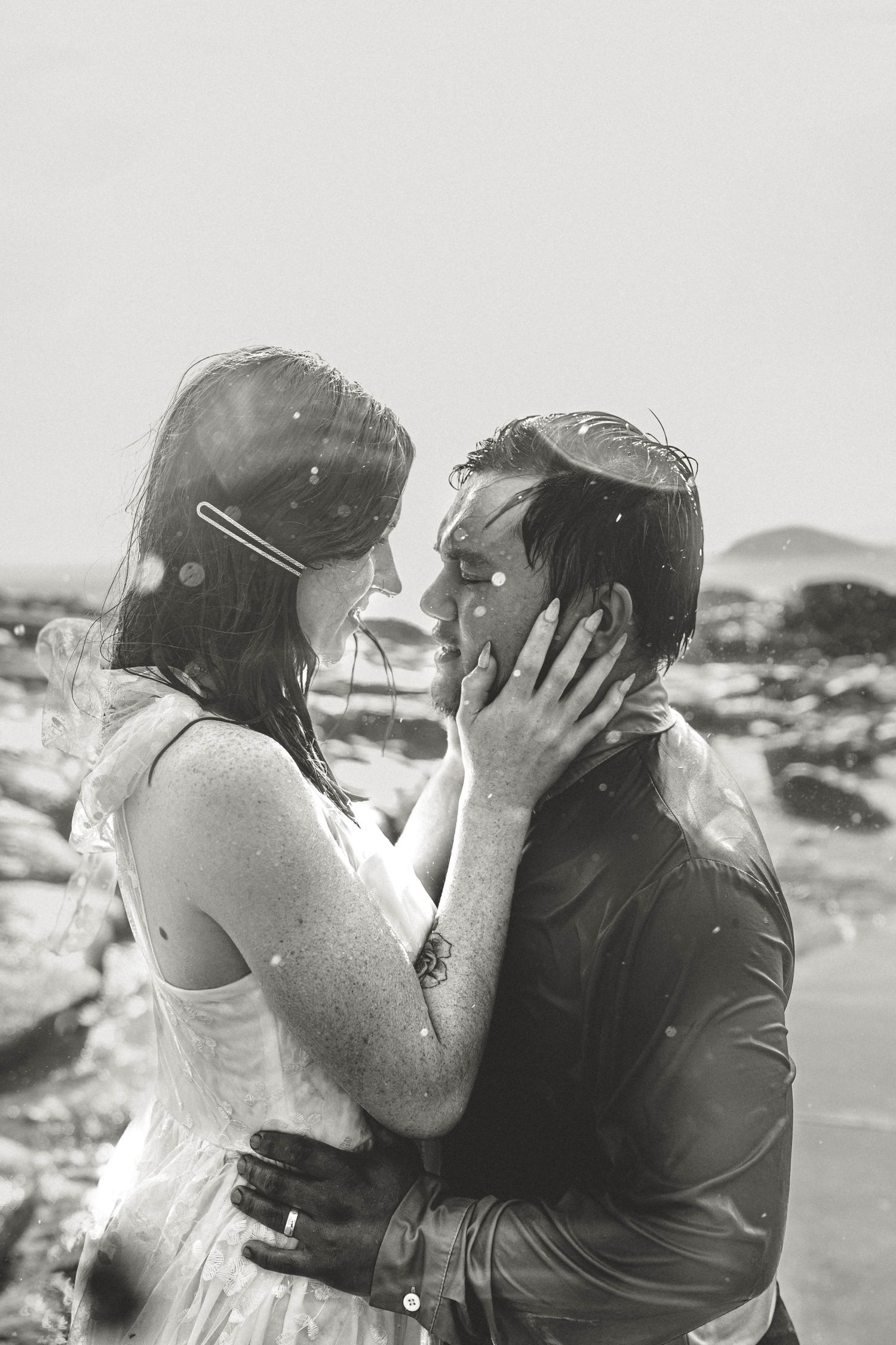 romantic rain wedding kiss love black and white