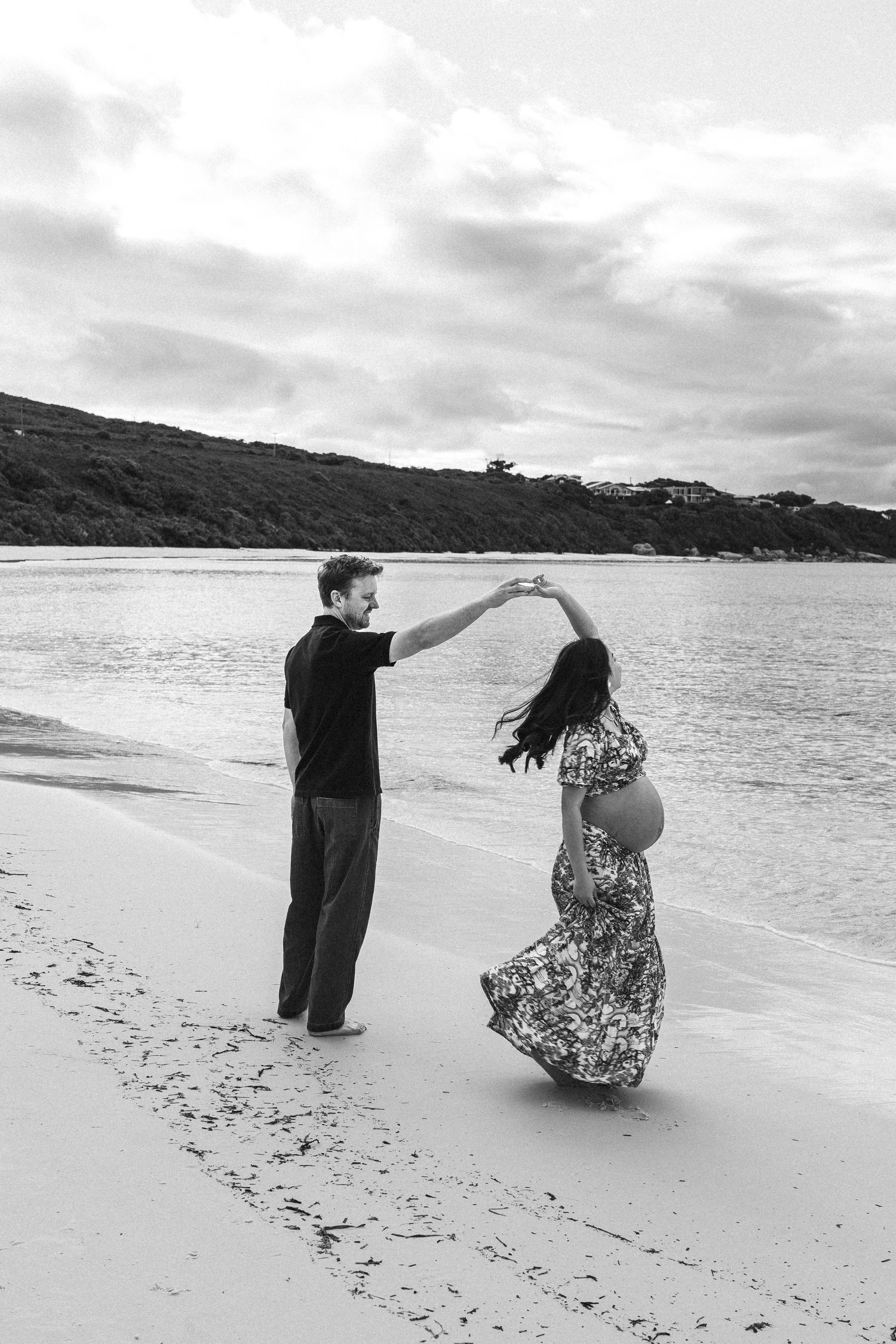 maternity picture beach couple love dancing black and white