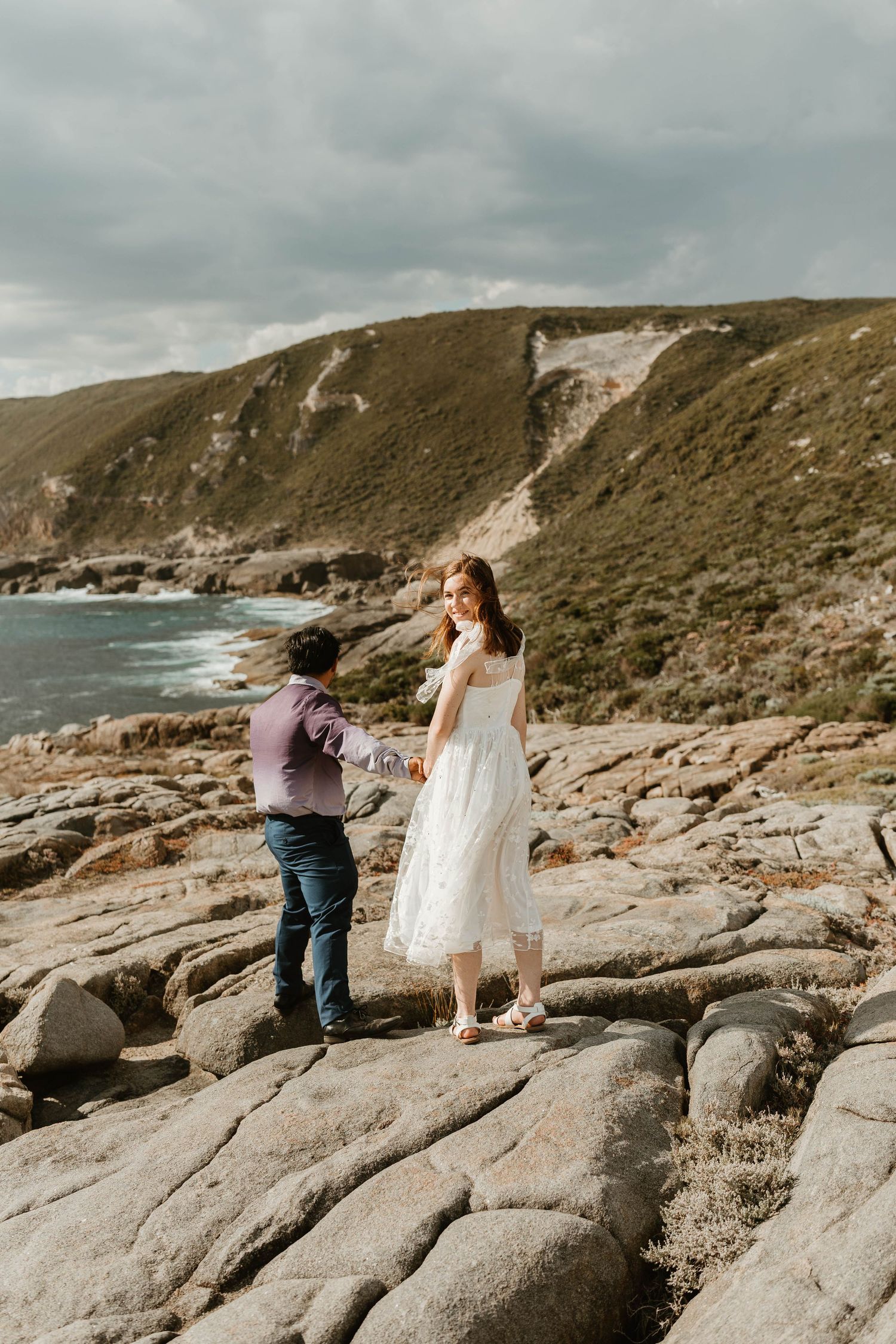 sunny cliff side wedding