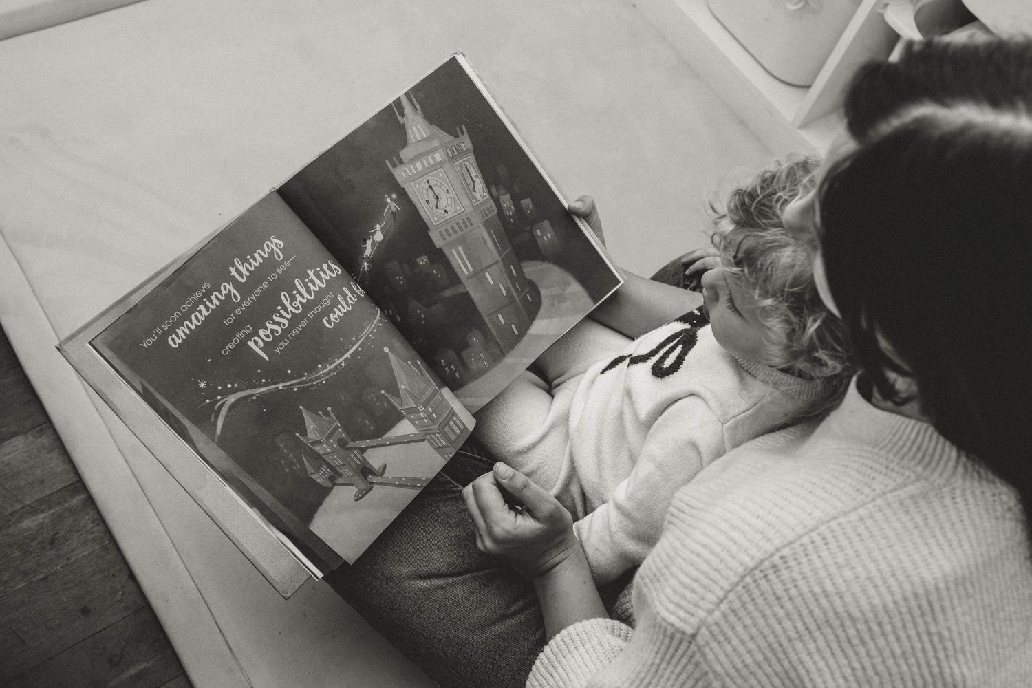 mother reading her child a book