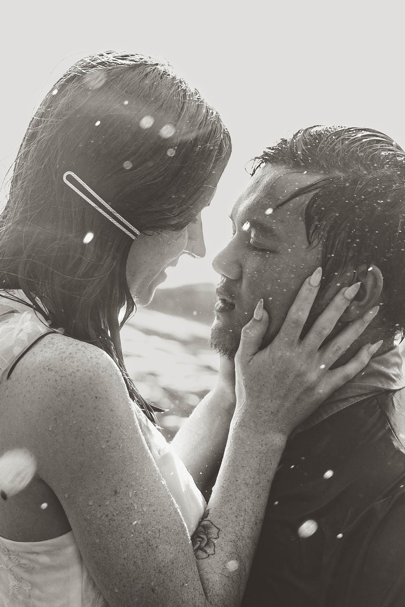 romantic rain wedding kiss love black and white