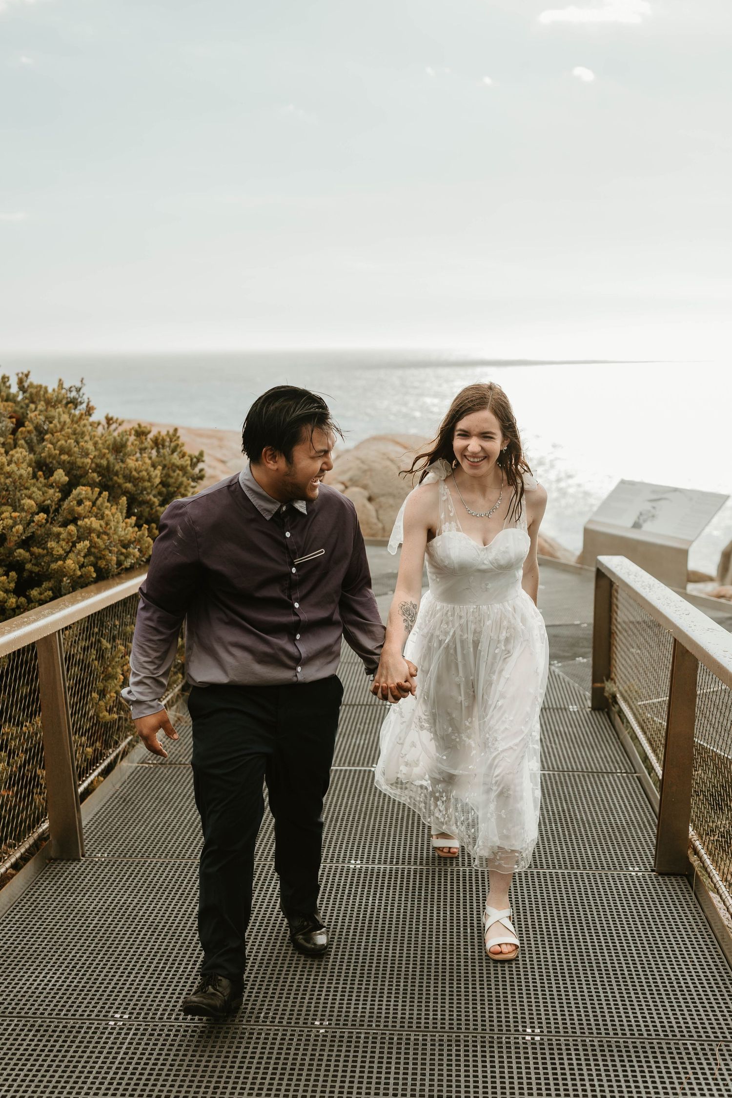 romantic running in the rain wedding