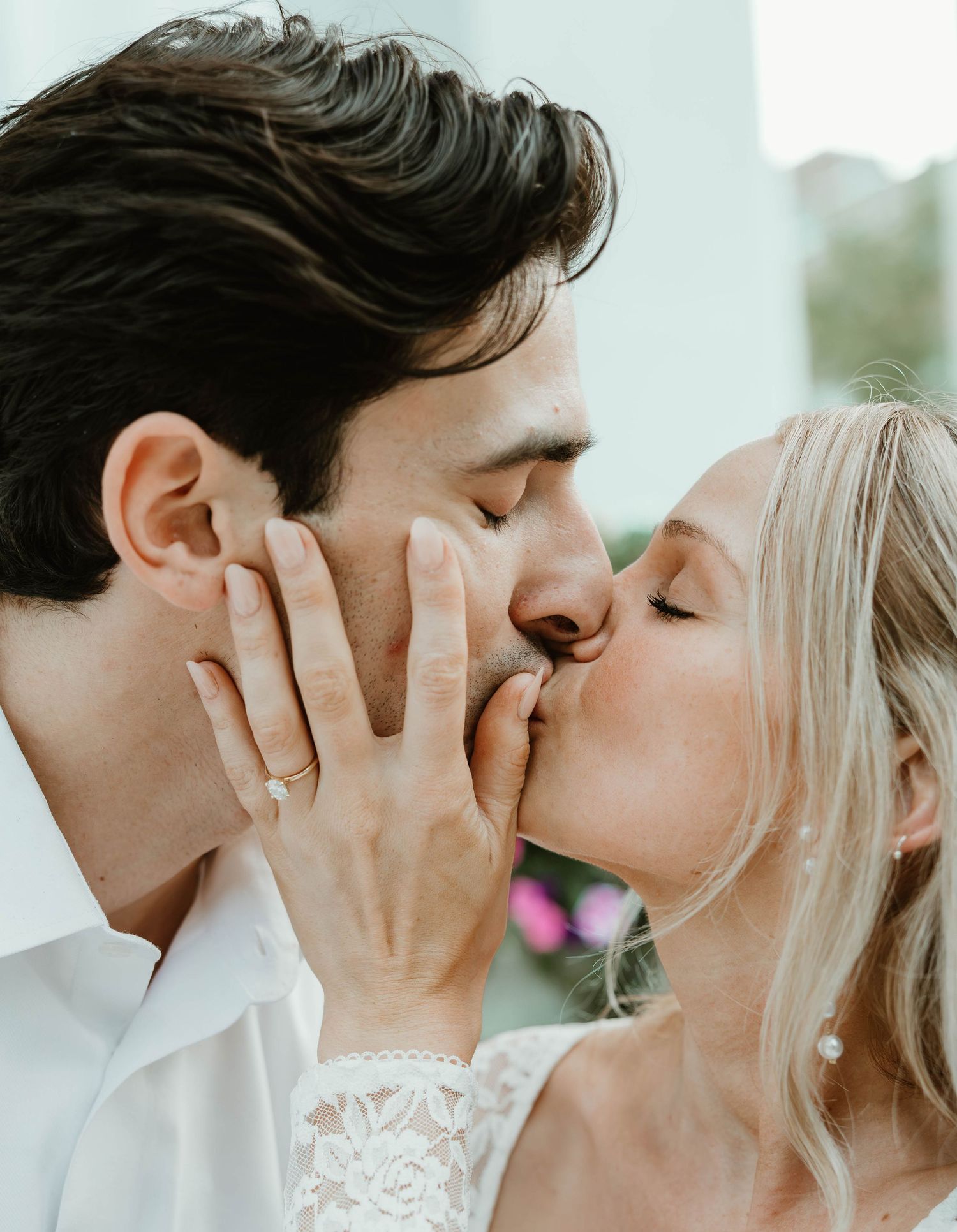A romantic series of wedding photos showing a couple sharing intimate kisses and tender moments together.