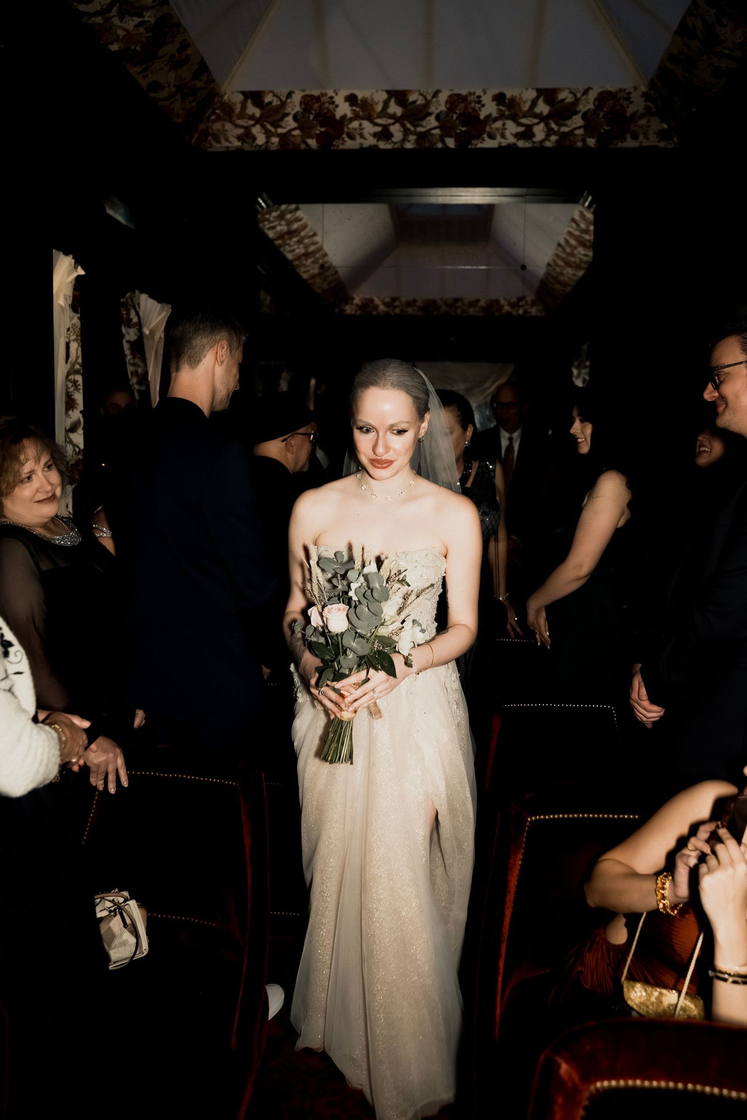 Sequence of dark atmospheric photos showing figures in formal attire at an evening event.
