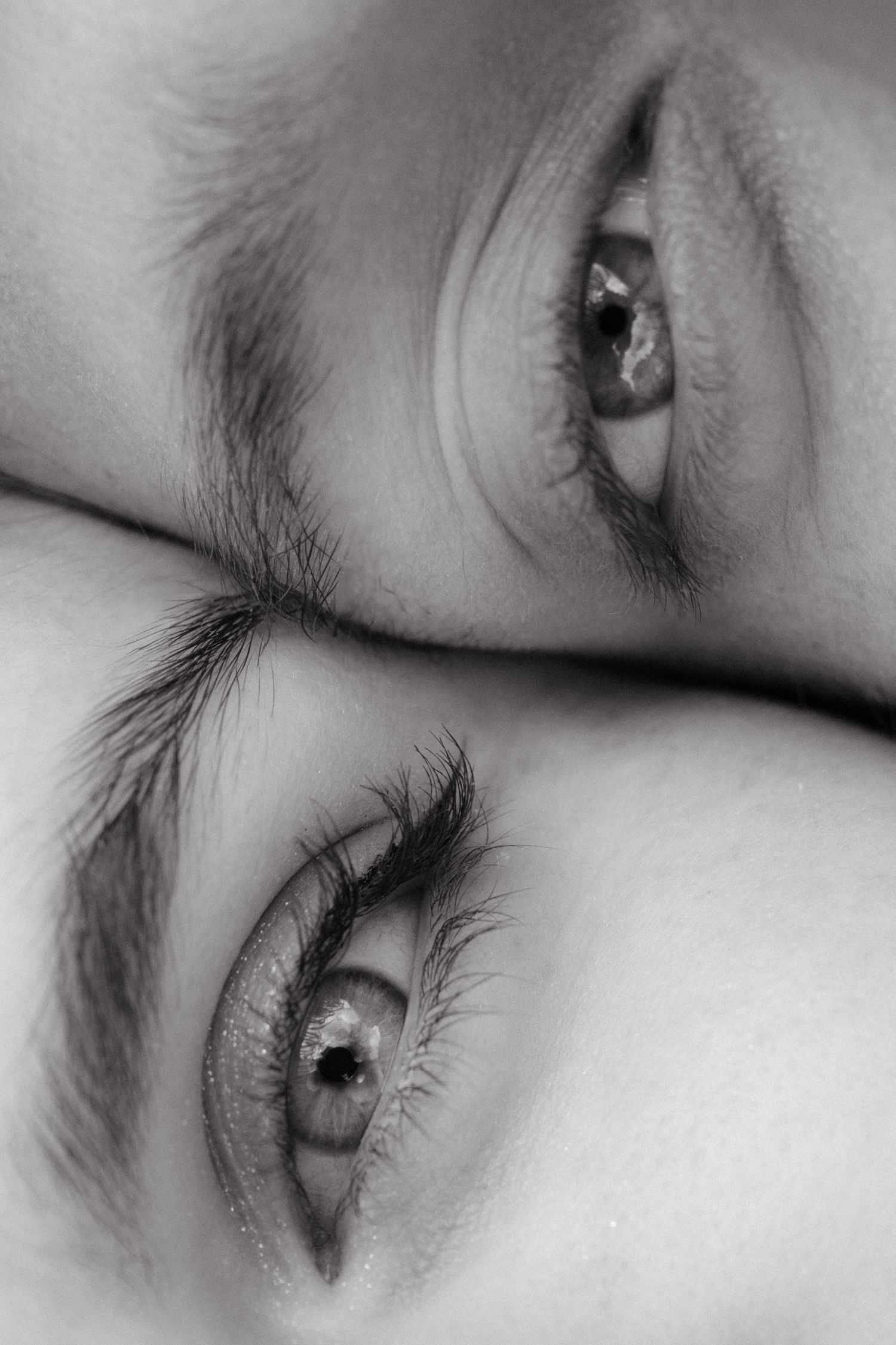 Artistic close-up series of eyes in black and white photography.