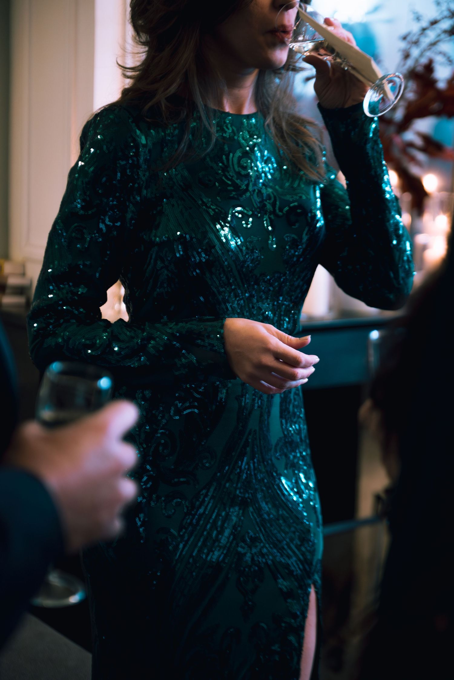 Paris evening event with woman in green sequins, cinematic fashion portrait with natural unposed movement photographed by Studio Reverie
