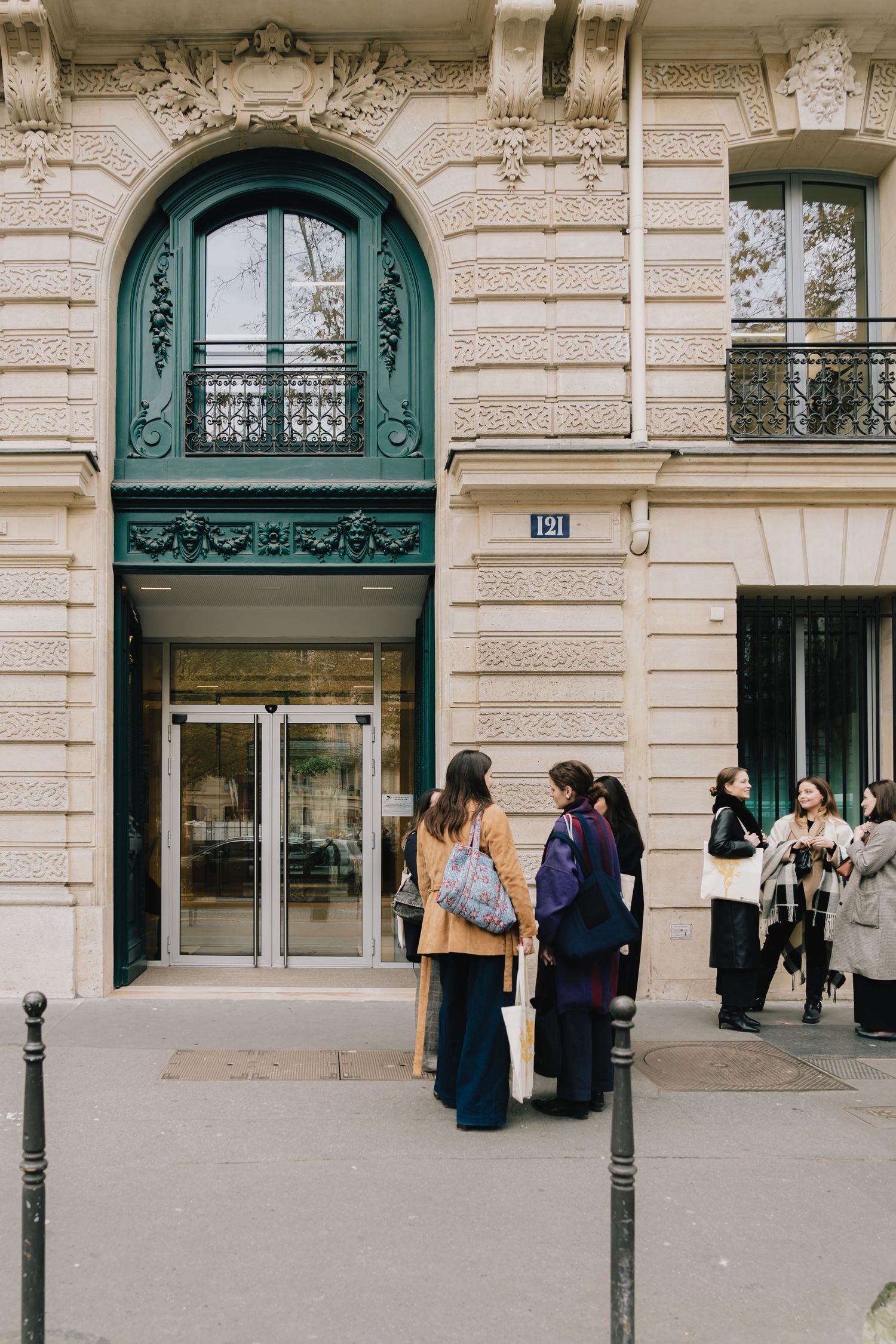 Guests arriving at Paris event venue, cinematic and documentary-style event photography with editorial flair