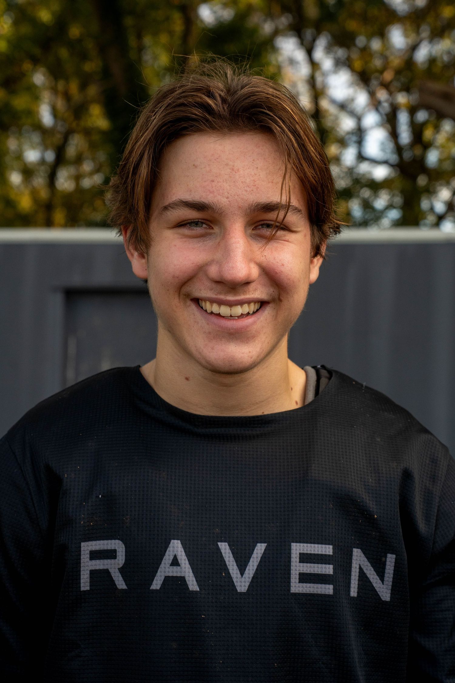 Four sequential headshots of someone wearing a black shirt with the text 'RAVEN' visible in the final frame.