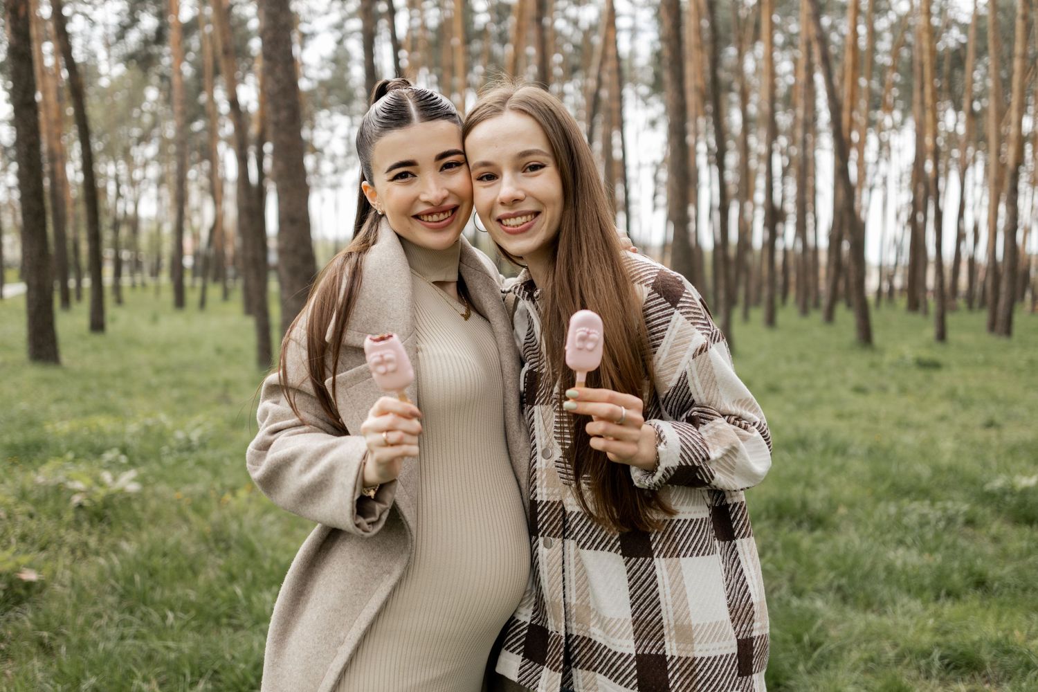 Couples share joyful moments together in a forest setting during a special celebration.